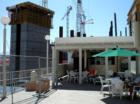 The Cosmopolitan Resort seen here about to rise directly above the Jockey Club pool area.  May 2007