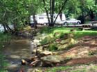ASHEVILLE, N.C. RV and Camper Park. French Broad River is the Setting.