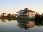 Manmade Pond, walking trails and bridges accent this small community