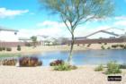 I took this photo in March 2006 as I entered the community of Crismon Creek. It is "not" a lake community, but this photo shows how deep the retention basins get after a large storm. Snow capped Superstition Mountain can be seen through the homes.