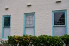 These lovely windows all in a row belong to the East Hawaii Cultural Center which at one time was the Hilo police station (designed by the Sheriff).