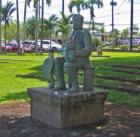 King Kalakaua sits in court in the Kalakaua park in downtown Hilo, the taro leaf symbolizeshis connection with the land and the Ipu gourd his connection with the culture, specifically chant and Hula.