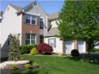 This is a typical style home in the Grande.  Most of the homes are 3 or four bedrooms with 2.5 baths.  This is the Alexander Model.
      You can search homes in Colts Neck by visiting http://www.monmouthmls.com