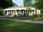 Columbus Ga - Fort Benning -  The Joseph House located on Broadway with the government center looming in the background.