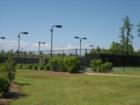 Homeowners private tennis court area of The Bluffs on the Waterway.