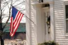 Honor and Remembrance - Memorial Day 2007, South Glastonbury, CT. American Flag flies on traditional white house.