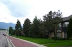 The Sherwood condominiums are located at the southern boundary of Park Hill, on Airport Road, just east of Circle Drive. Airport Road provides a clear view of Pikes Peak in the background.