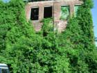 Abandoned tobacco warehouse, Columbia.  Photo by Brian Schulman