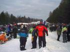 Tons of snowsledders in a annual charity ride in started by nascar great Ricky Craven!
