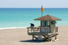 A rough day at the office for this life guard.  Photo taken and provided by Richard Price of New Vista Inc. (http://www.newvistainc.com