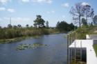 View down the canal of a fresh water home in Cape Coral Florida. The  canal ststem on this homes location runs 9 miles long and connects several small lakes along the way! 