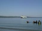 Mukilteo ferry and divers just off shore on a beautiful spring day.