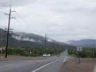 Rainsoaked road during the summer monsoon season in Tucson, AZ.  The view is heading east.