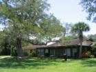 Randolph Farm clubhouse and yard offer picnic tables and a room that overlooks the intercoastal waterway.