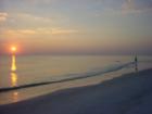 why you come to Longboat Key. Peaceful white sand beaches and Fantastic Sunsets
      This is a typical evening stroll to look for shells