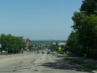 On a clear day you can see the Minneapolis skyline from downtown Burnsville. You can just make the city out in the far background.