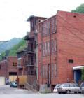 MARSHALL, N.C. Historic District. Restoration Underway. This is a back street photo. Buildings ovrlook the French Broad River.