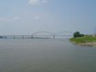 View of the Hernando-Desoto Bridge from one of the Mississippi Riverboat Cruises. (This is I-40 going over the river) Downtown Memphis. Separates Tennessee from Arkansas.