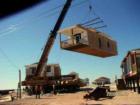 Chill Out's 3rd module being craned into place.  This is a modular beach cottage of 1700+ Sq ft.  Set on Dauphin Island a few months after Katrina took the original cottage of 25 yrs. 
