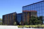 Embassy Suites Hotel reflection across the Anza Boulevard