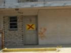 This building was an apartment building located in Chalmette, La. Hurricane Katrina damage has left this building for Demo. Notice the big red x. 