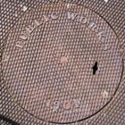 An antique sewer lid