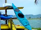 Kayak Rests by Banks Channel Wrightsville Beach NC Photo By Ginger Sala Wilmington NC Realtor