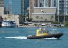 Pilot boat coordinating traffic in Honolulu Harbor