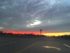 Beautiful Waco Sunset. I snapped this photo from the inside of my car while driving towards one of our many gorgeous sunsets. You can see one of the Waco water towers in the distance.