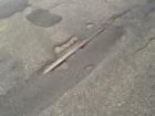 These are old trolley tracks, below the street surface, at 50th and Xerxes.  Abandoned in 1954,  there were 523 miles of take with 1,240 trolley cars running in 1893.  They still run the troll along Lake Harriet, and Calhoun to this day.