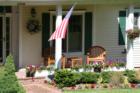 Happy 4th of July - Home with American Flag, rocking chair on front porch