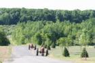 Two tractors heading down a hill to work at the local farms, South Glastonbury, CT