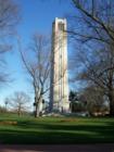 The North Carolina State University Bell Tower is a landmark on Hillsborough Street, Raleigh, NC.  A Wolfpack victory prompts a bath of red light on this attractive edifice.