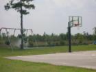 Community basketball court and kids play area in the Walkers Woods community of Carolina Forest in Myrtle Beach