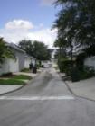 Garages are tucked behind the homes in the Celebration Florida community of Lake Evalyn.