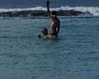 Snorkelers at Onekahakaha Beach Park...