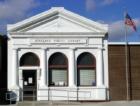 The present Kirkland Public Library is better known as the 'old bank'. 
      The Kirkland Library. Once the State Bank of Kirkland, built in 1913, it was credited for being one of the only banks in the country that didn't close during the Depression