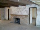 Red Rock State Park - Sedona, Sunken Fireplace as you enter the House of Apache Fire at what looks to be the master bedroom room from an entryway from the courtyard area.