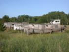 A living memorial to a retired fishing fleet, these boats rest on the shore at Cornucopia, Wisconsin