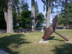 Ship's propeller and fluke anchors in front of the Madeline Island Historical Museum