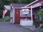 Newago's Fish Market and Oly's.  Oly's is touted as "Wisconsin's Northernmost Barber Shop & Salon".