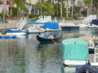 Romantic gondola rides takes you through the man-made canals of Naples in Long Beach, CA.