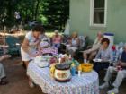 Caring Singles corn roast.  Photo by Brian Schulman