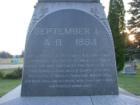 Detail from the base of the Hinckley Fire monument which states that the Hinckley fire swept over "400 square miles of country, including the villages of Hinckley, Sandstone, Mission Creek and Brook Park".