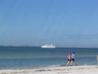 Quiet walks on the beach or a cruise on the gambling ship ( in the background) are all part of the island life.