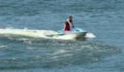Someone playing on his personal watercraft on Big Lake.