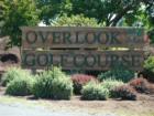 The Entrance Sign at the Overlook Golf Course. Golfer's enjoying a beautiful day at the Overlook Golf Course. The Overlook Golf Course is on the East Side of Big Lake in Mount Vernon.