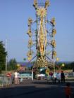 "Brownstone Days" carnival ride framed by Lake Superior in the background, Washburn, Wisconsin