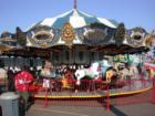Enjoying the merry-go-round at "Brownstone Days" festival in Washburn, Wisconsin