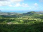 View from the Pali lookout on Oahu.  In the foreground you can see the famous "Ko'olau Golf Course" and in the back is the city of Kaneohe and Kaneohe Bay.